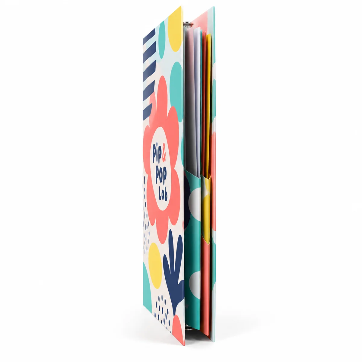 Side view of a colorful Pip & Pop Lab pocket folder with playful coral, aqua, and yellow artwork and layered inserts.