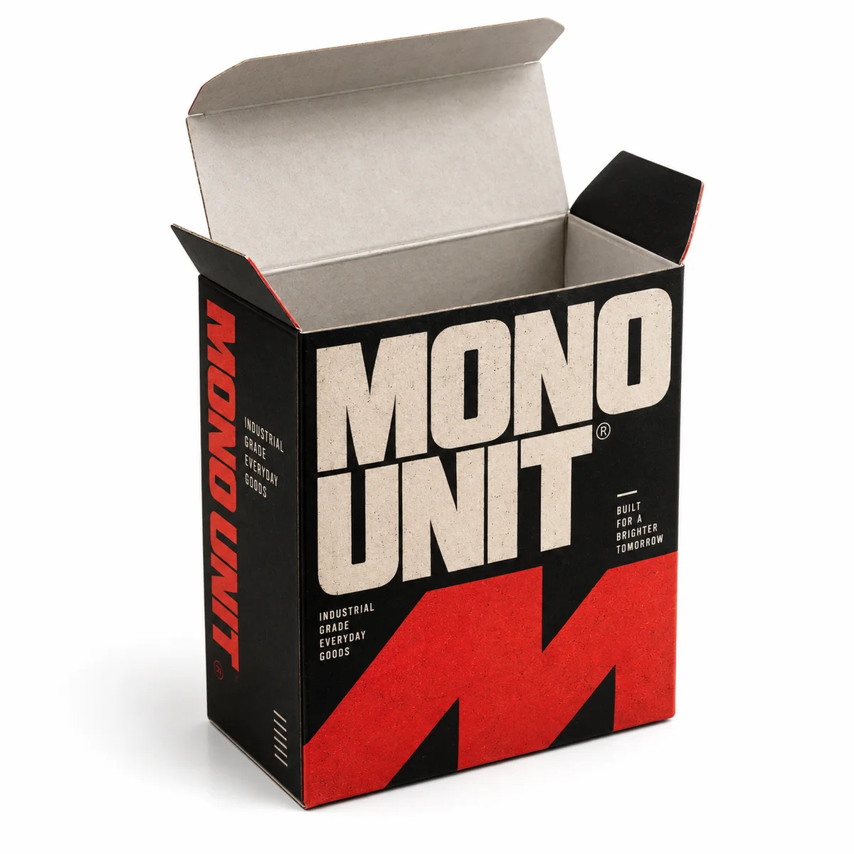 Open MONO UNIT packaging carton featuring bold off-white typography, black panels, red graphics and raised top flaps.