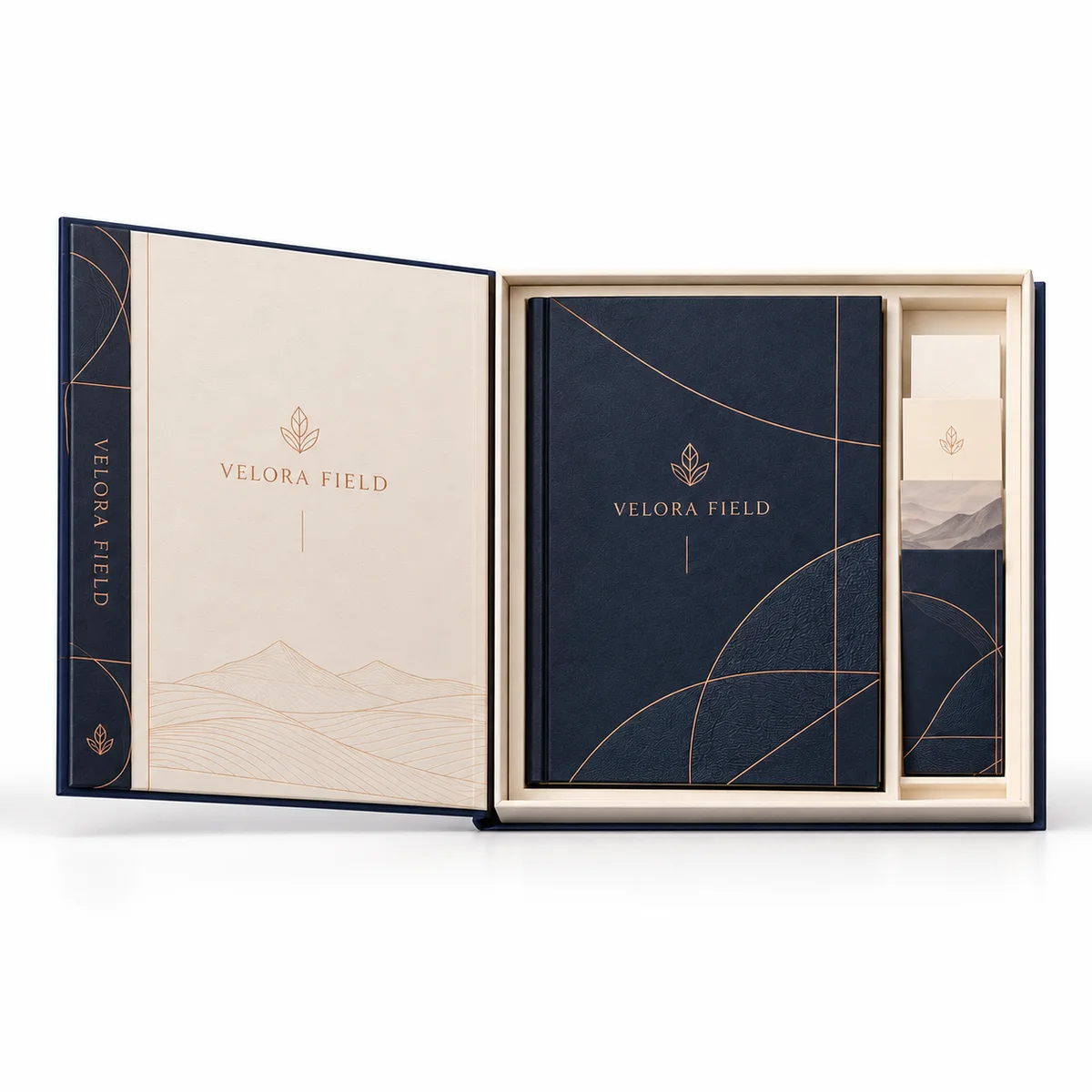 Front-facing view of a navy custom booklet box with copper artwork, ivory interior, fitted booklet, and stacked presentation cards.
