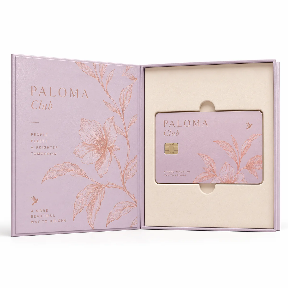 Open lilac PALOMA Club book-style credit card presentation box with peach botanical line artwork and a cream fitted card holder.