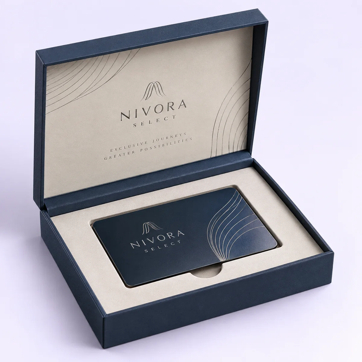 Open navy NIVORA SELECT rigid credit card presentation box with cream fitted card insert and silver artwork on a pale lilac background.