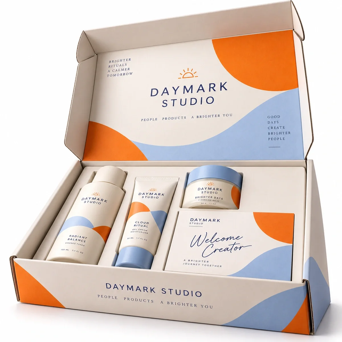 Front view of an open DAYMARK STUDIO influencer PR kit with indigo branding, coordinated skincare samples and a creator welcome card.