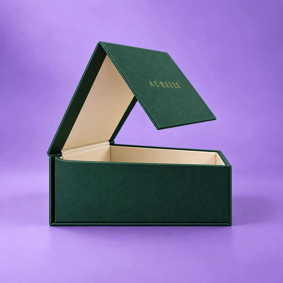 Side profile of an open custom magnetic gift box with a structured green hinged lid and smooth ivory lining