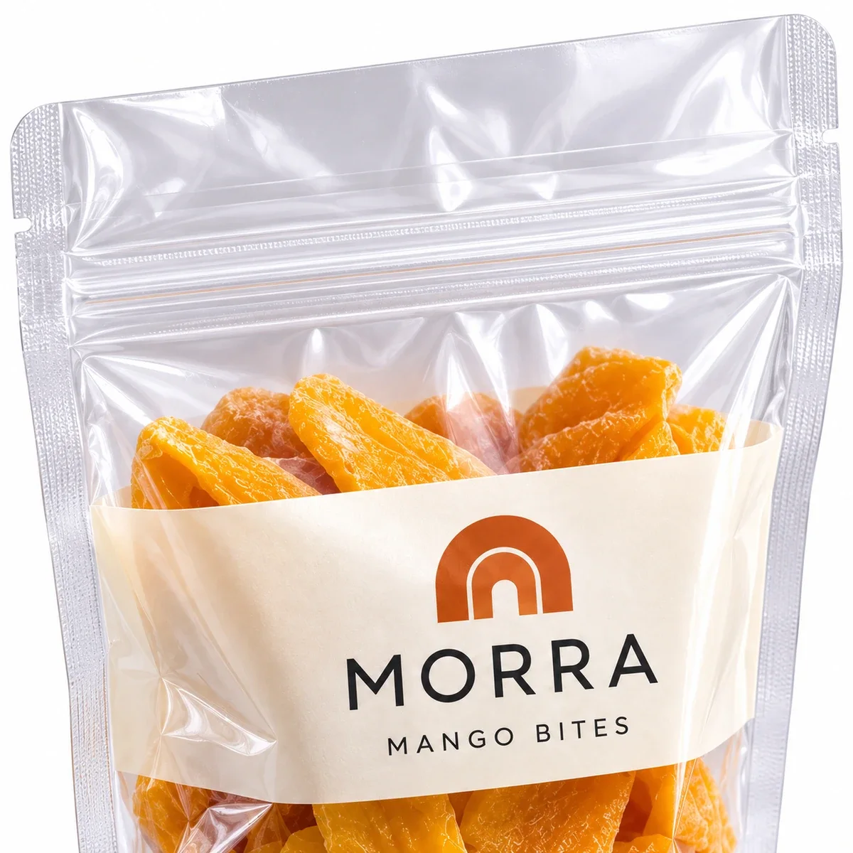 Close-up of the clear MORRA Mango Bites pouch showing its zipper closure, tear notch, and cream logo band.