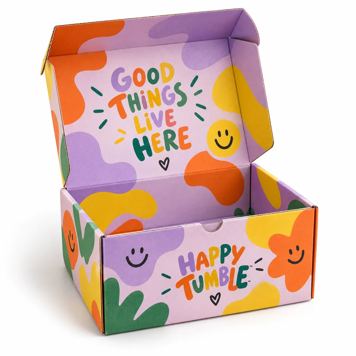 Open HAPPY TUMBLE tuck top gift box with lavender, orange, yellow, and green shapes, smiley icons, and a printed inside lid.