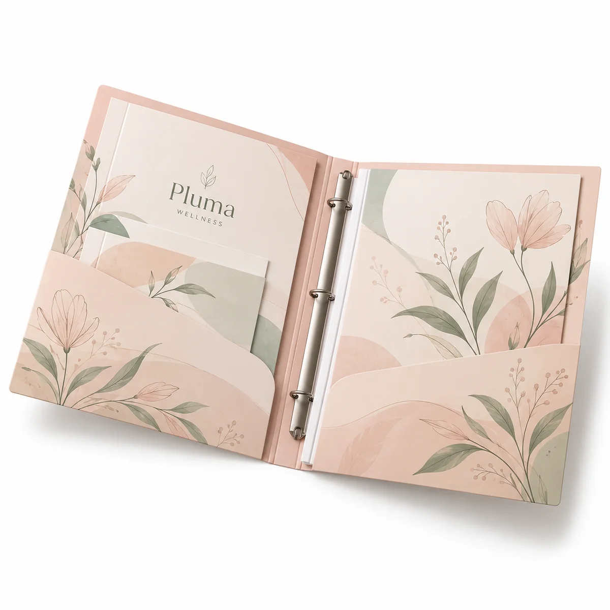 Open Pluma Wellness 3 prong pocket folder with blush pink botanical artwork, sage green leaves, and two interior pockets.