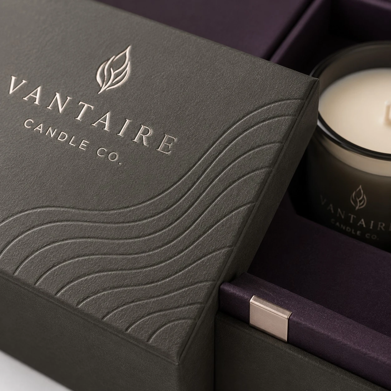 luxury candle packaging boxes embossed detail