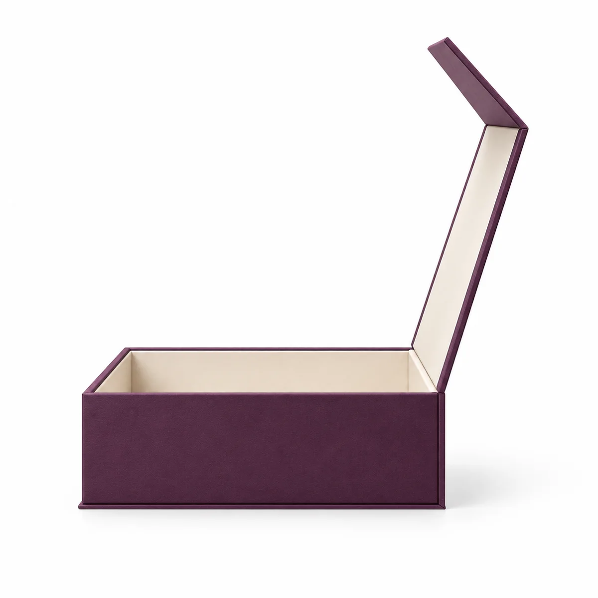 Side profile of a deep plum magnetic rigid box showing its open hinged lid, ivory interior, and structured base.