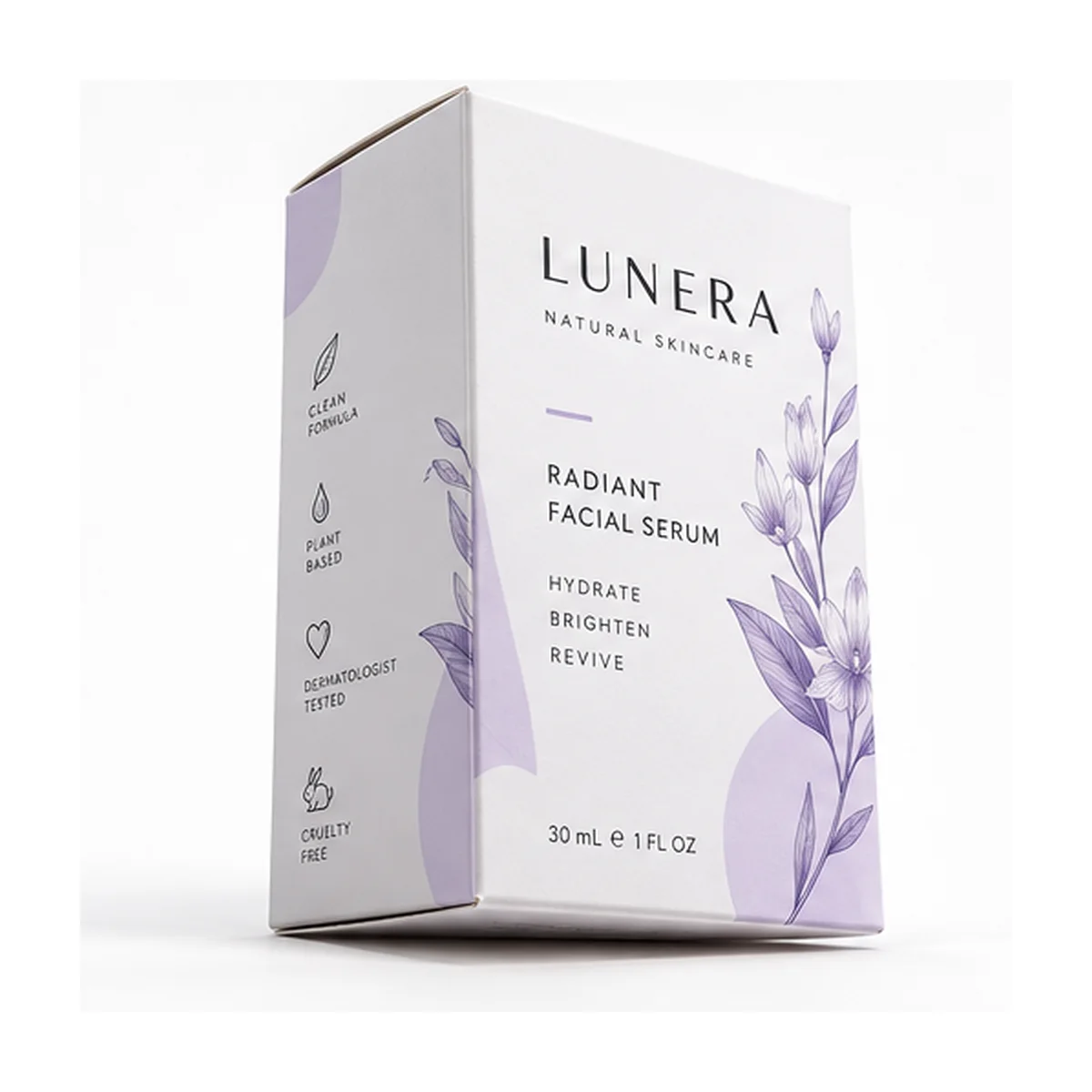 Low-angle photograph of a white tuck top skincare carton displaying LUNERA branding, lavender botanical illustrations, and folded paperboard construction.